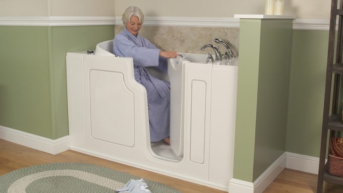 Cozy Laminate Wood Flooring With White Baseboard And Cozy Safe Step Tub For Inspiring Unique Bathtub Design Ideas