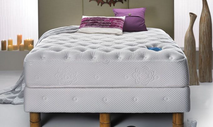 Excellent PranaSlee Super Vinyasa Queen Mattress On Tufted Bed With Candle For Modern Bedroom Design