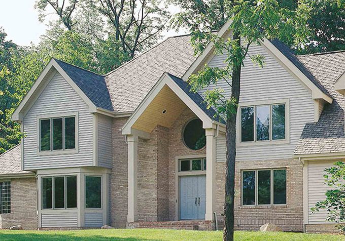 LandMark Exteriors Home Design With Alside Siding And Loewen Windows Plus Round Windows And Therma Tru Entry Doors Plus Gable Roof